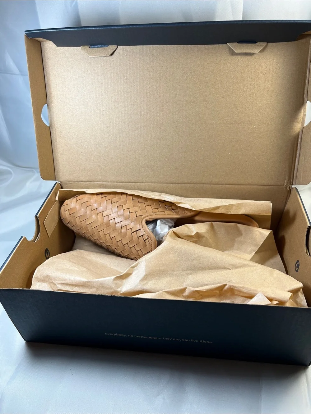 OluKai women’s Tan Woven Leather Slip-On Loafers